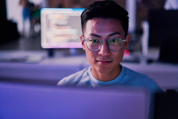 Man concentrating in front of computer